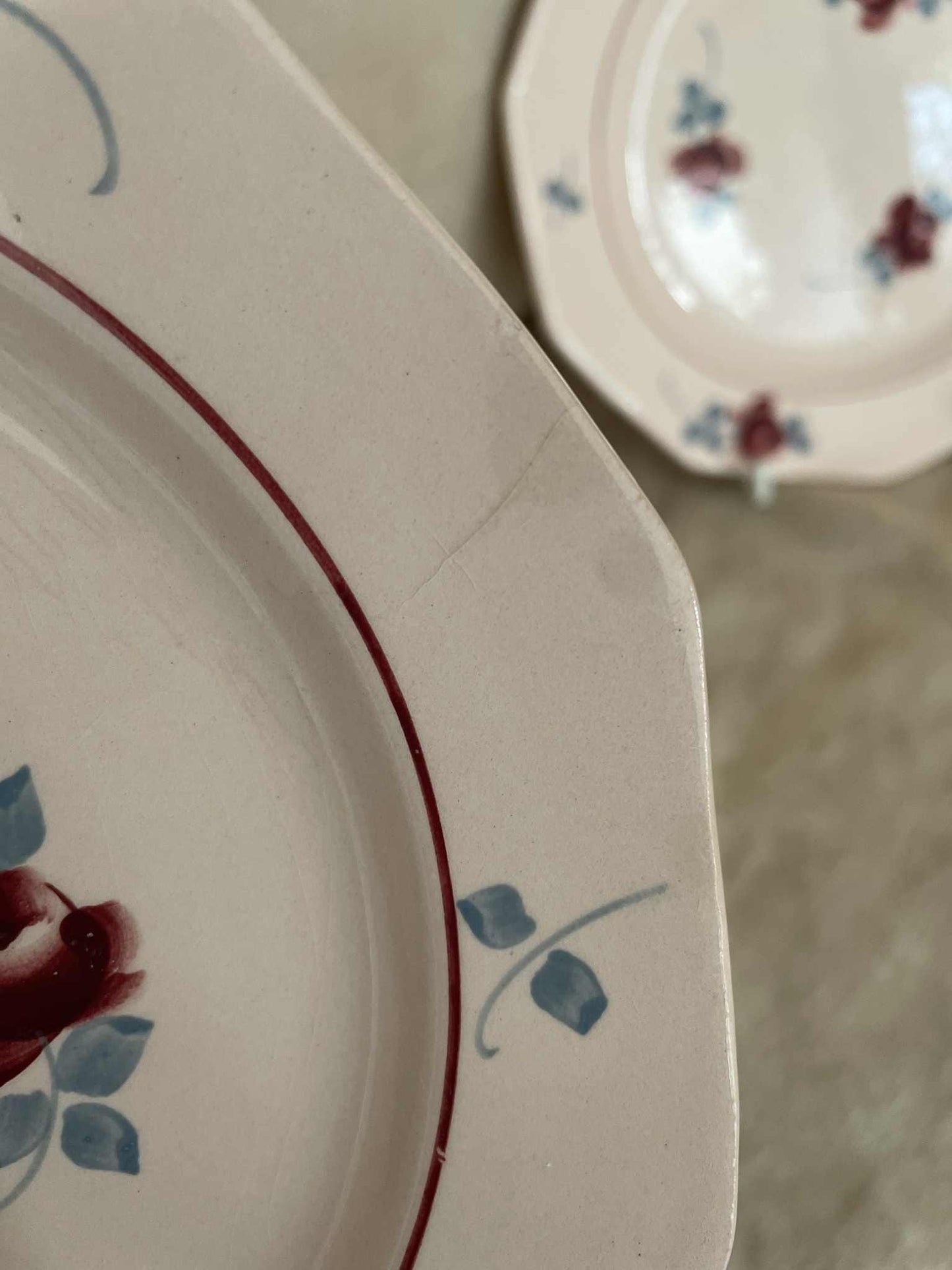 A pair of small 10 sided dessert plates by Saint Amandinoise - Pompadour