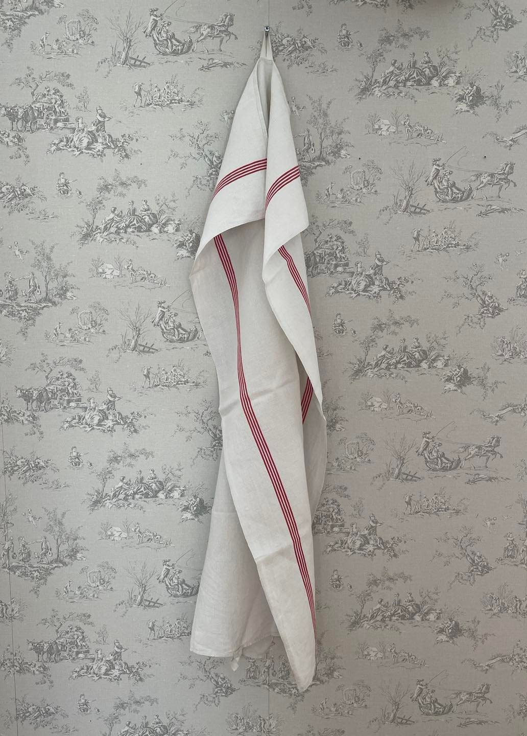 A single large red stripe Metis ( linen/cotton mix) tea towel