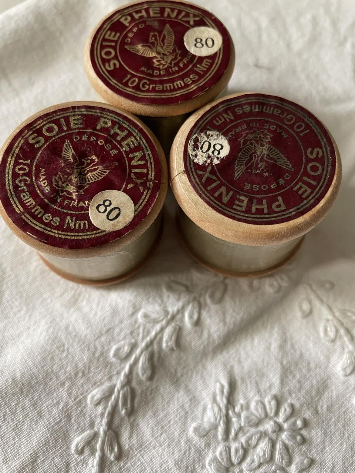 3 Vintage wooden spools of silk thread