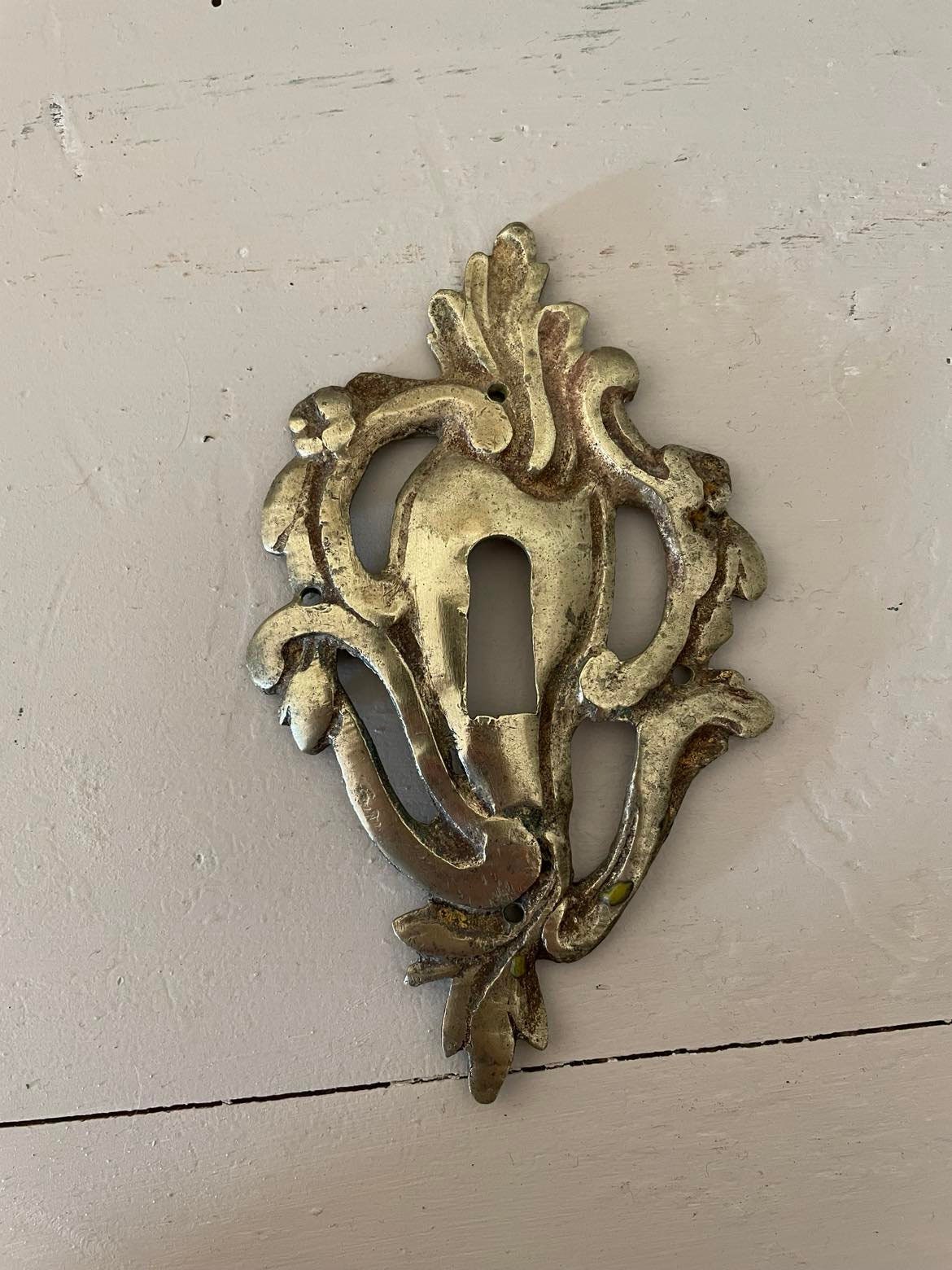 Antique brass key surround