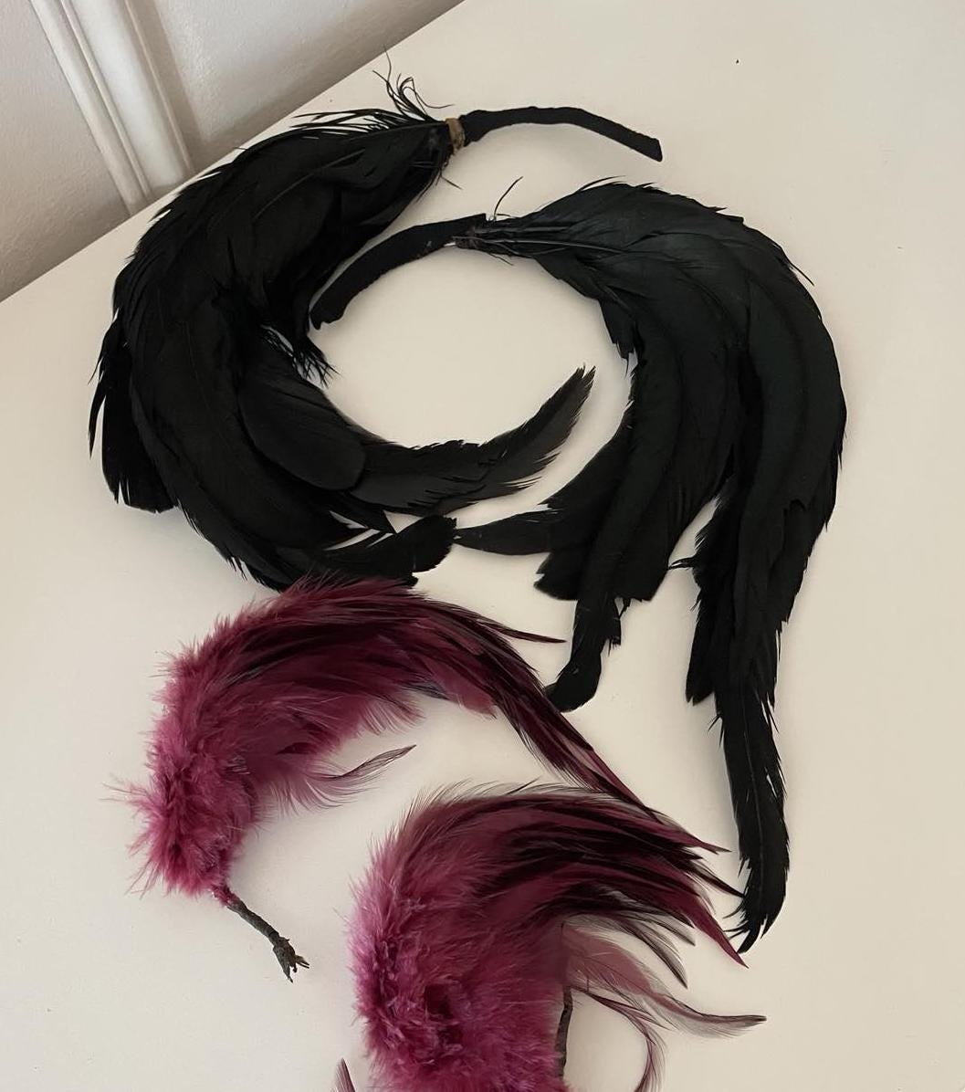 4 Original antique Milliners feather hat embellishments.