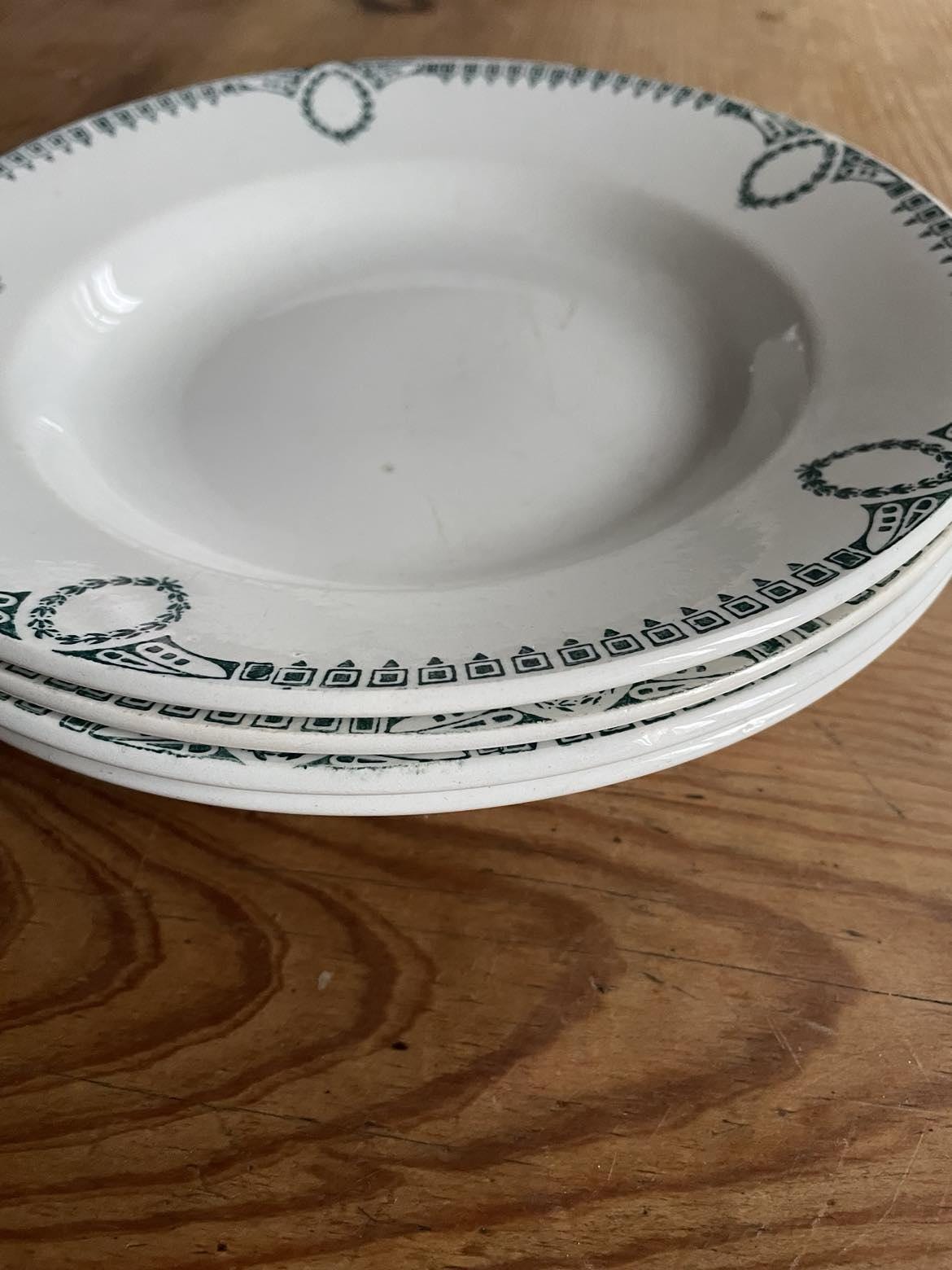 A set of 4 shallow bowls by St Amand Céranord