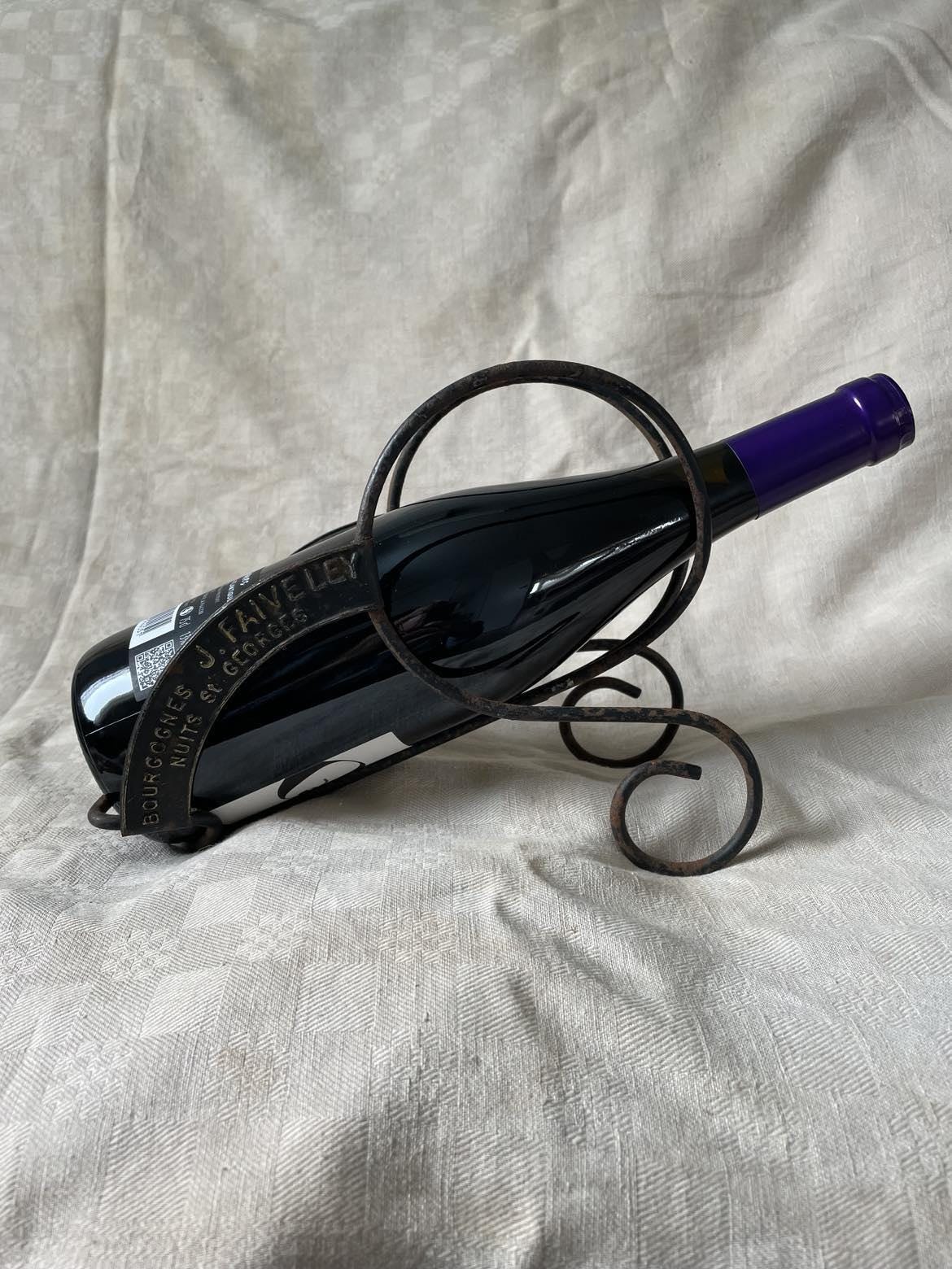 Vintage publicity bottle rest for Bourgognes (Burgundy wine) produced by Faiveley