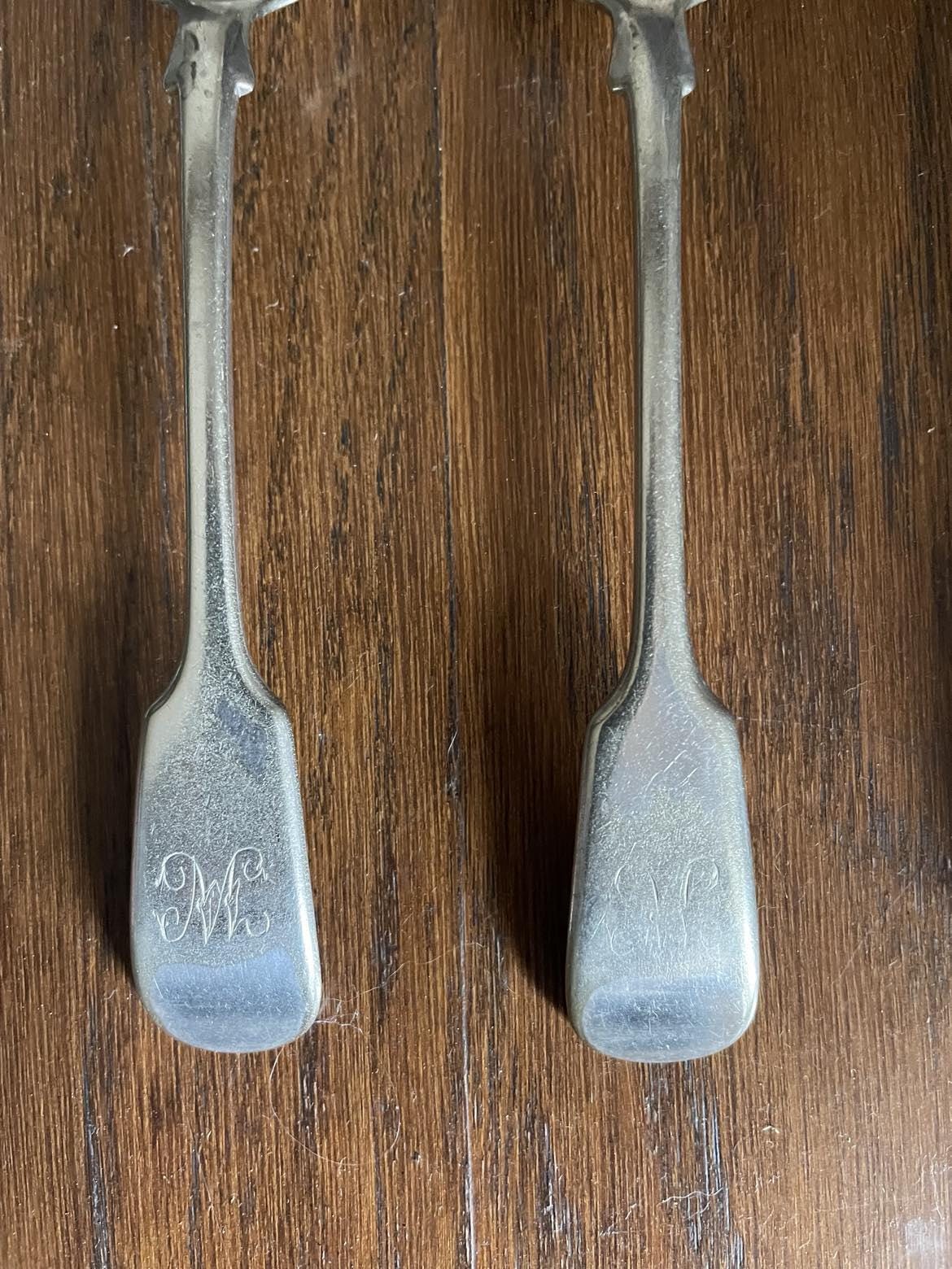 A set of 3 Monogrammed Silver plated spoons