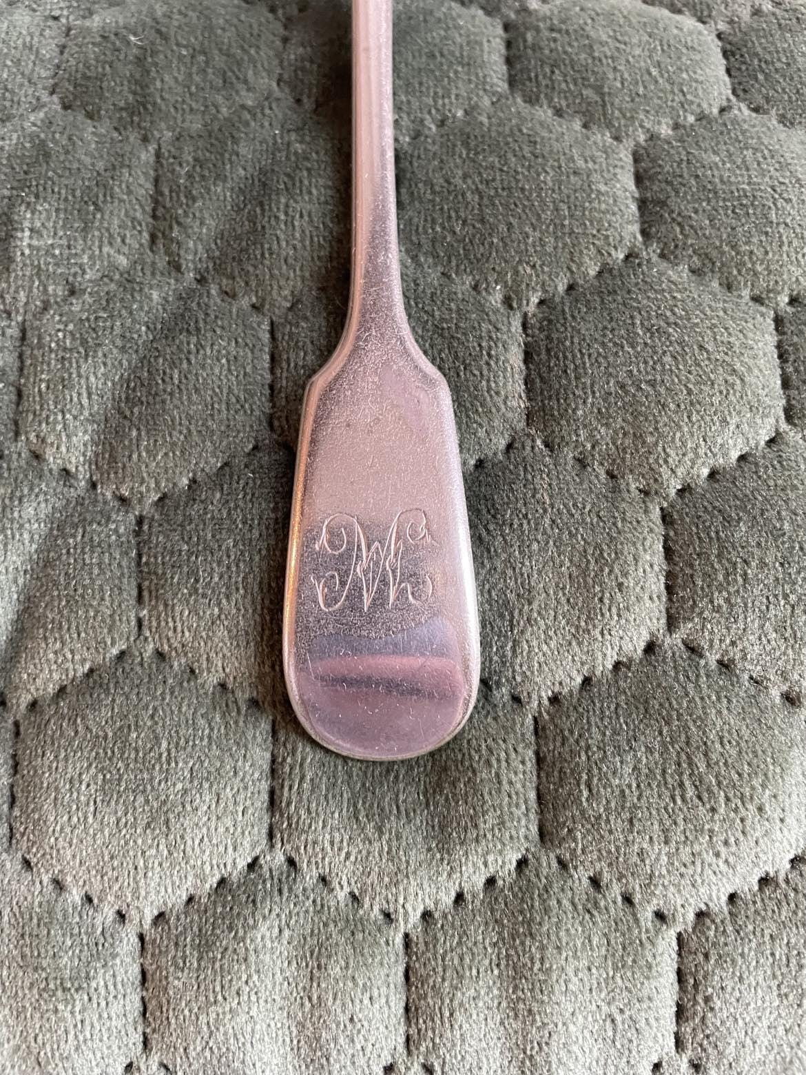 A set of 3 Monogrammed Silver plated spoons