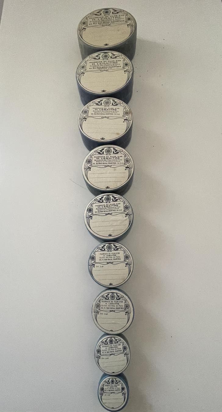 Set of 9 round lidded pharmacy boxes