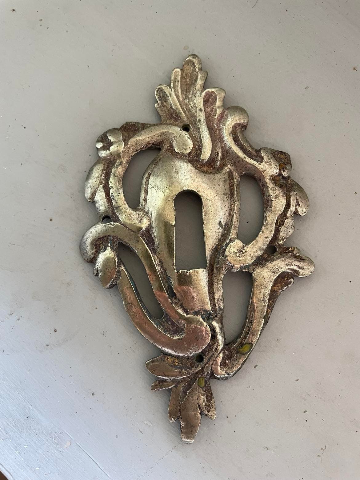 Antique brass key surround