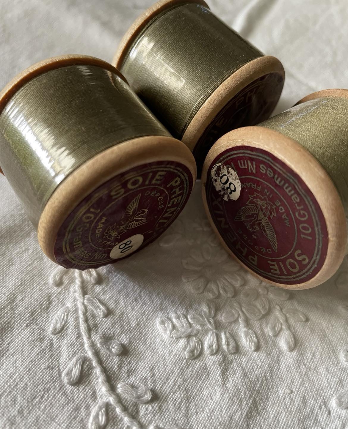 3 Vintage wooden spools of silk thread
