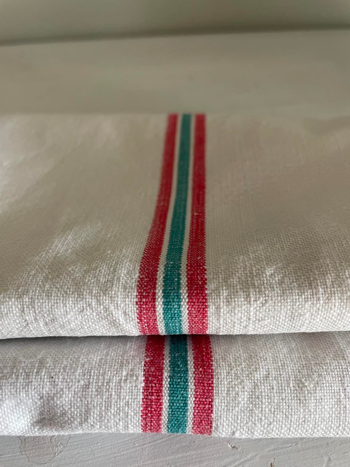 A single red and green stripe Metis ( linen/cotton mix) tea towel