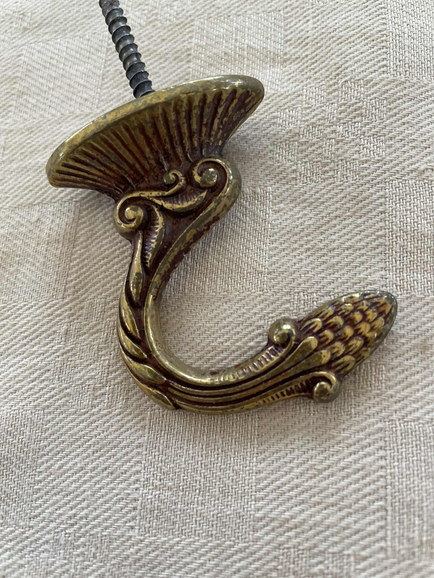 A pair of  Brass hooks for curtain tie backs
