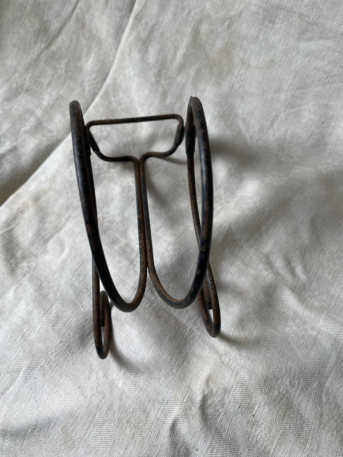 Vintage publicity bottle rest for Bourgognes (Burgundy wine) produced by Faiveley