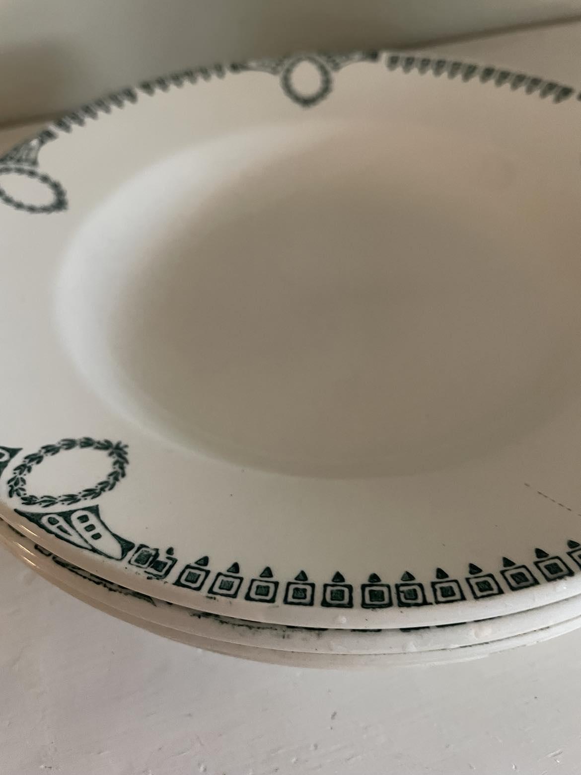 A set of 4 shallow bowls by St Amand Céranord