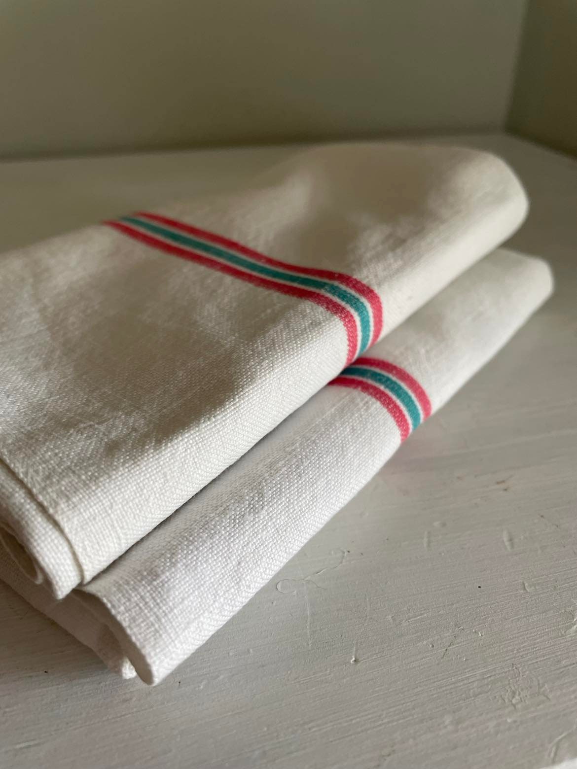 A single red and green stripe Metis ( linen/cotton mix) tea towel
