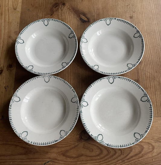 A set of 4 shallow bowls by St Amand Céranord