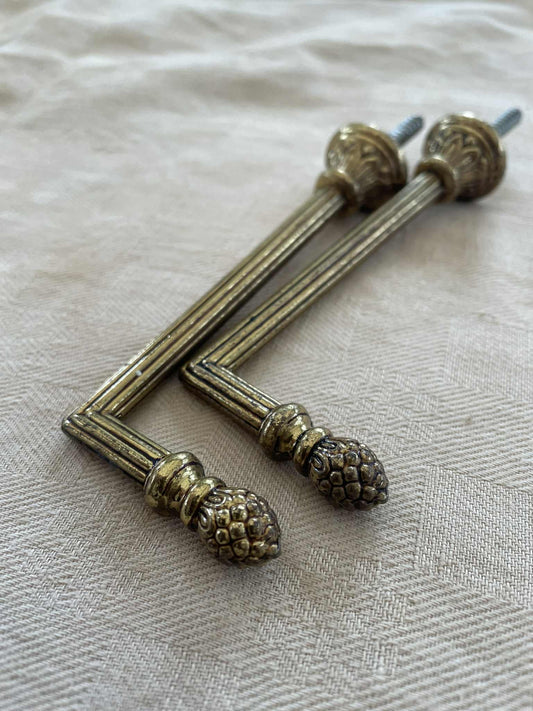 A Pair of brass curtain tie back hooks. - 10cm