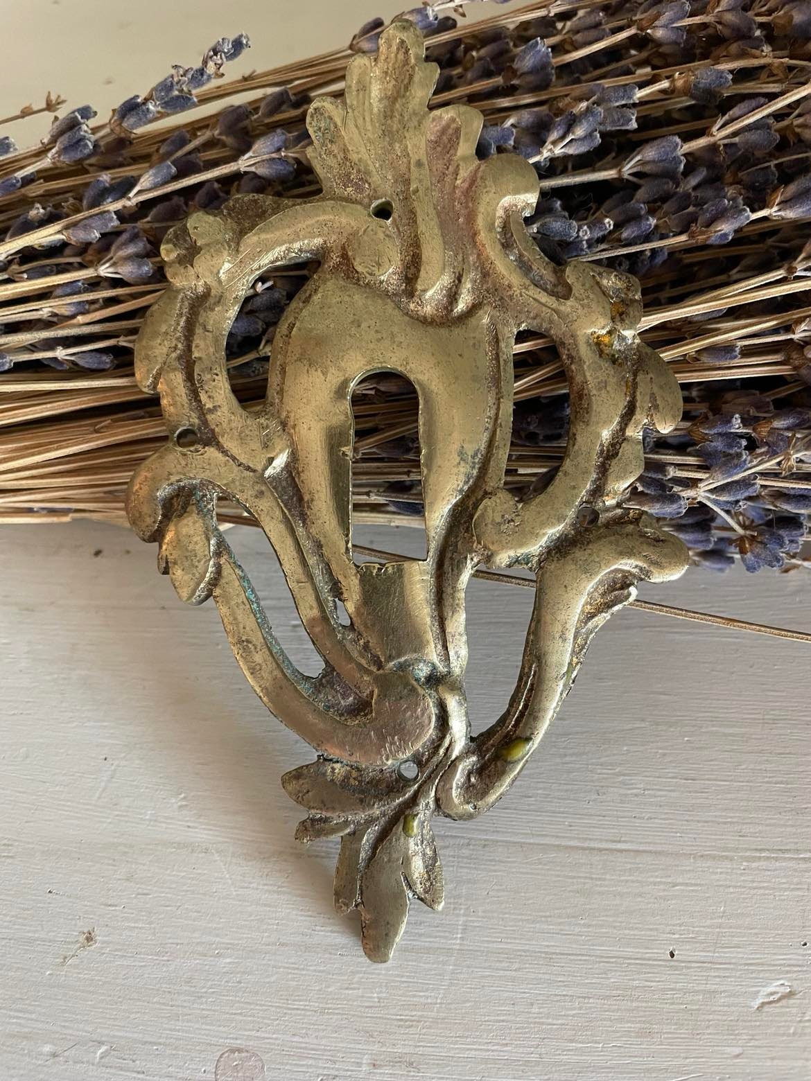 Antique brass key surround