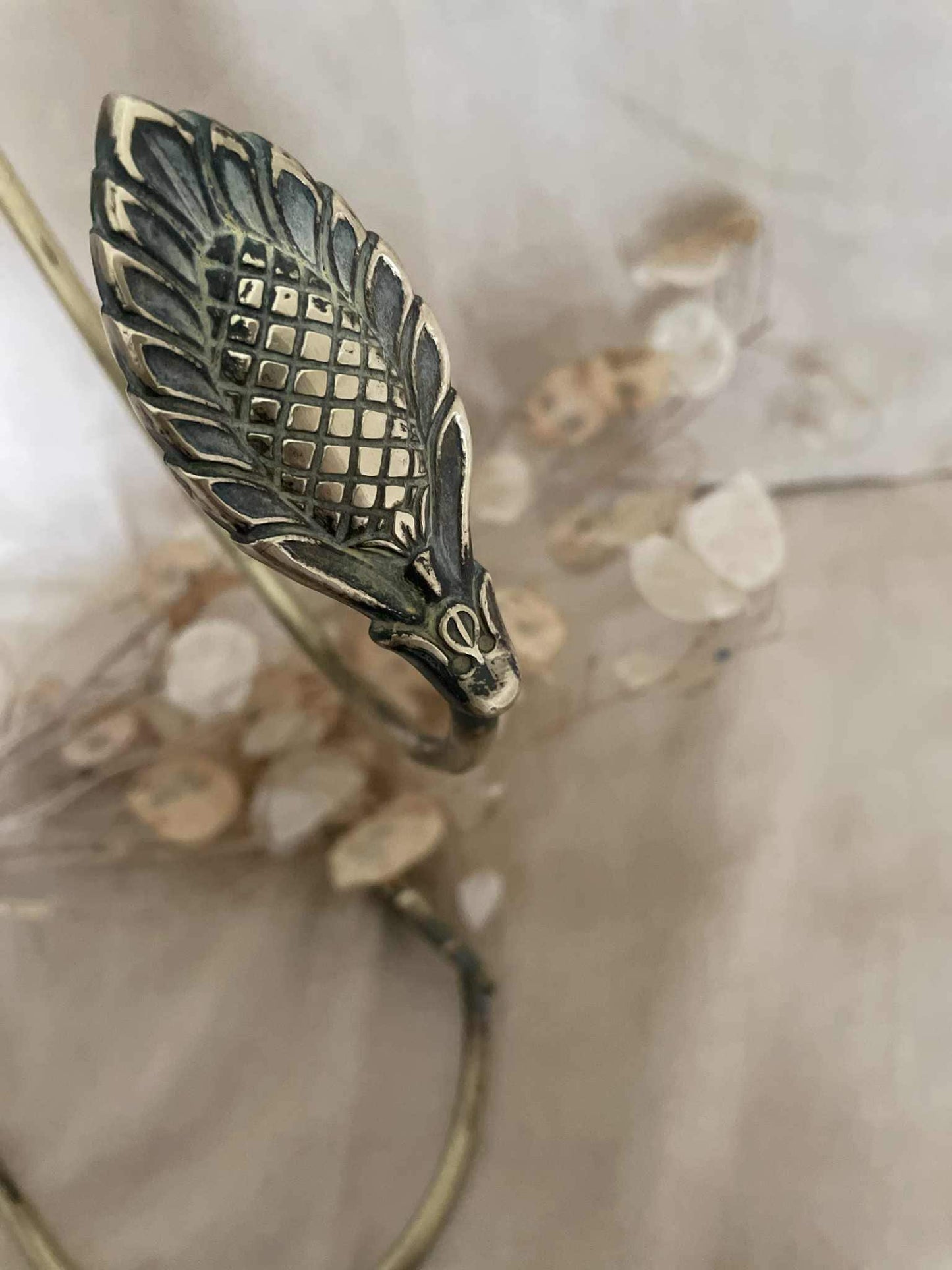 One pair of brass suspended swan neck curtain tie backs / embrasse rideau