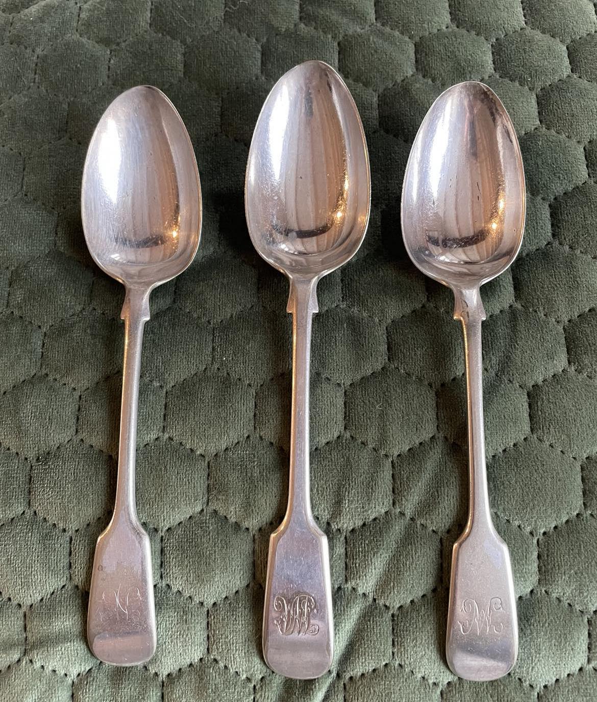 A set of 3 Monogrammed Silver plated spoons
